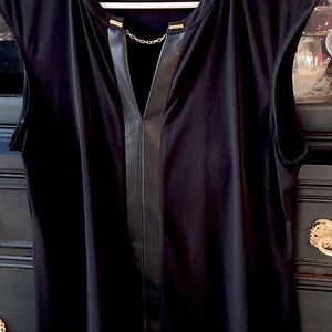 Calvin Klein sleeveless blouse.